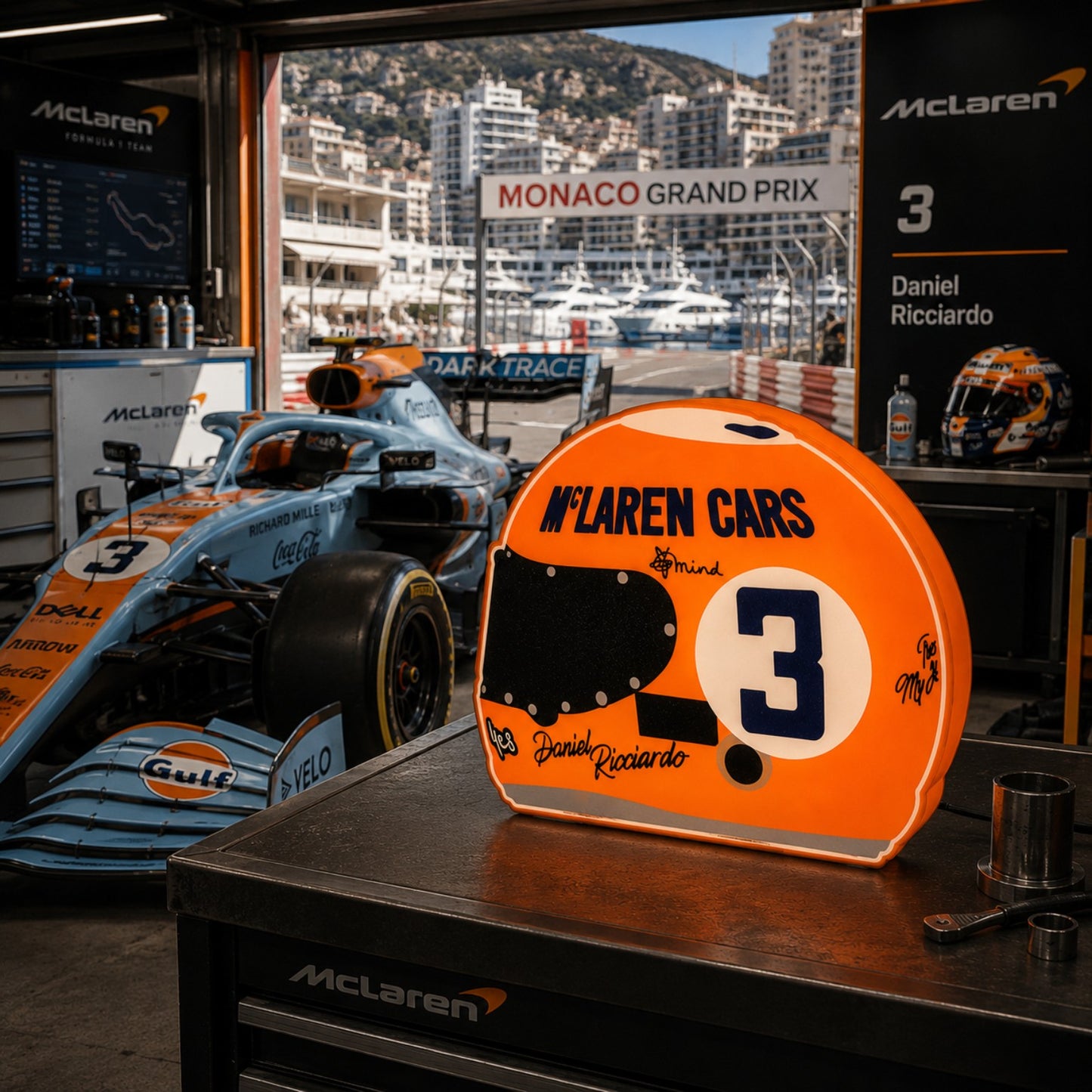 Daniel Ricciardo Monaco special helmet LED light box in a McLaren Monaco Grand Prix garage-style setting