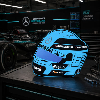 George Russell Mercedes helmet LED light box in a Mercedes Formula One garage-style setting