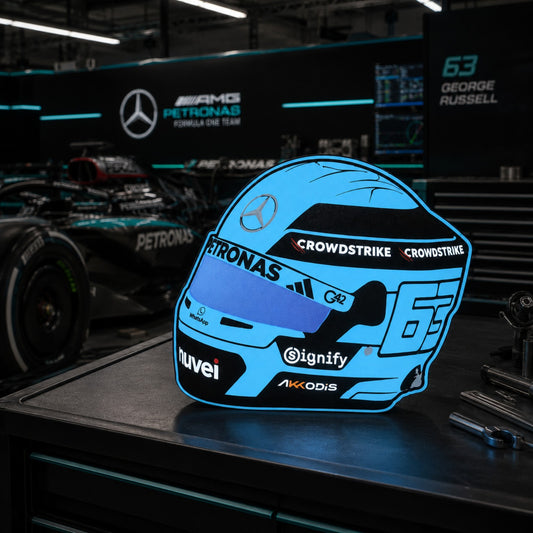 George Russell Mercedes helmet LED light box in a Mercedes Formula One garage-style setting
