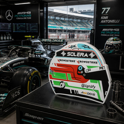 Kimi Antonelli Mercedes helmet LED light box in a Mercedes Formula One garage-style setting