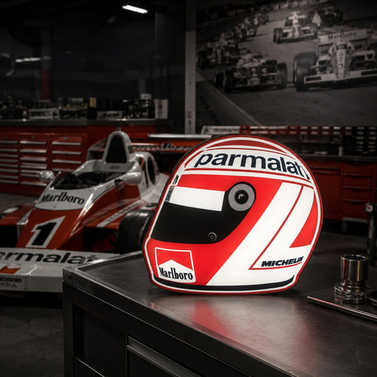 Niki Lauda classic helmet LED light box in a vintage Formula One garage-style setting