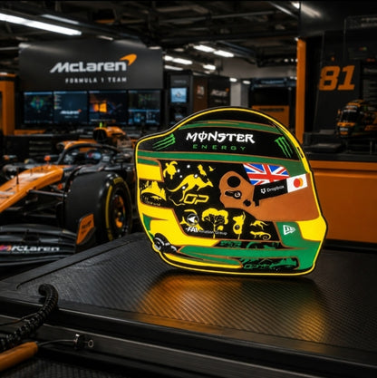 Oscar Piastri Melbourne special helmet LED light box in a McLaren Formula One garage-style setting