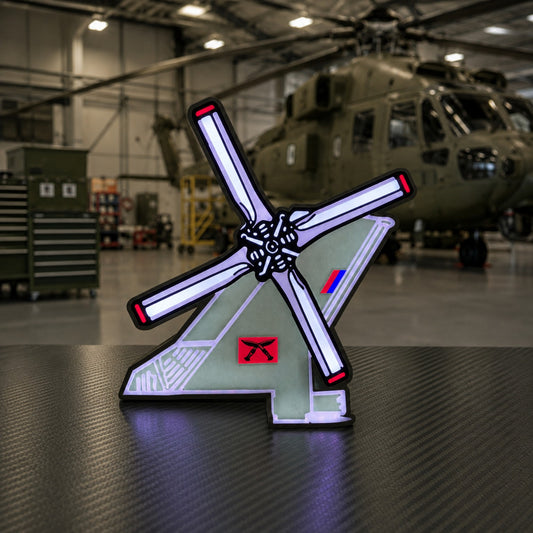 28 Squadron RAF Merlin helicopter LED light box illuminated in a military hangar