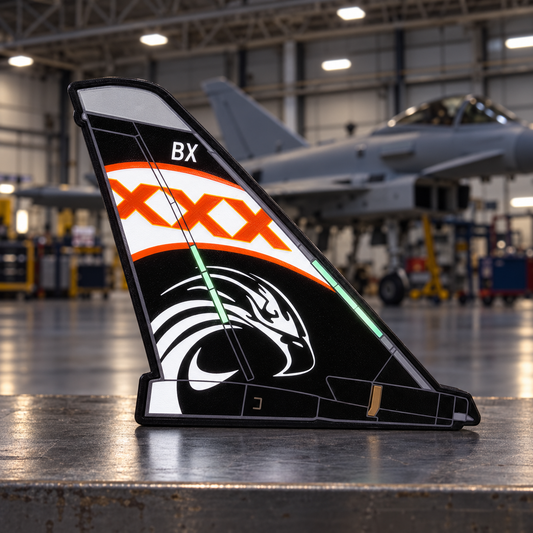 Illuminated black RAF 29 Squadron Typhoon 100th Anniversary LED tail light in an aircraft hangar