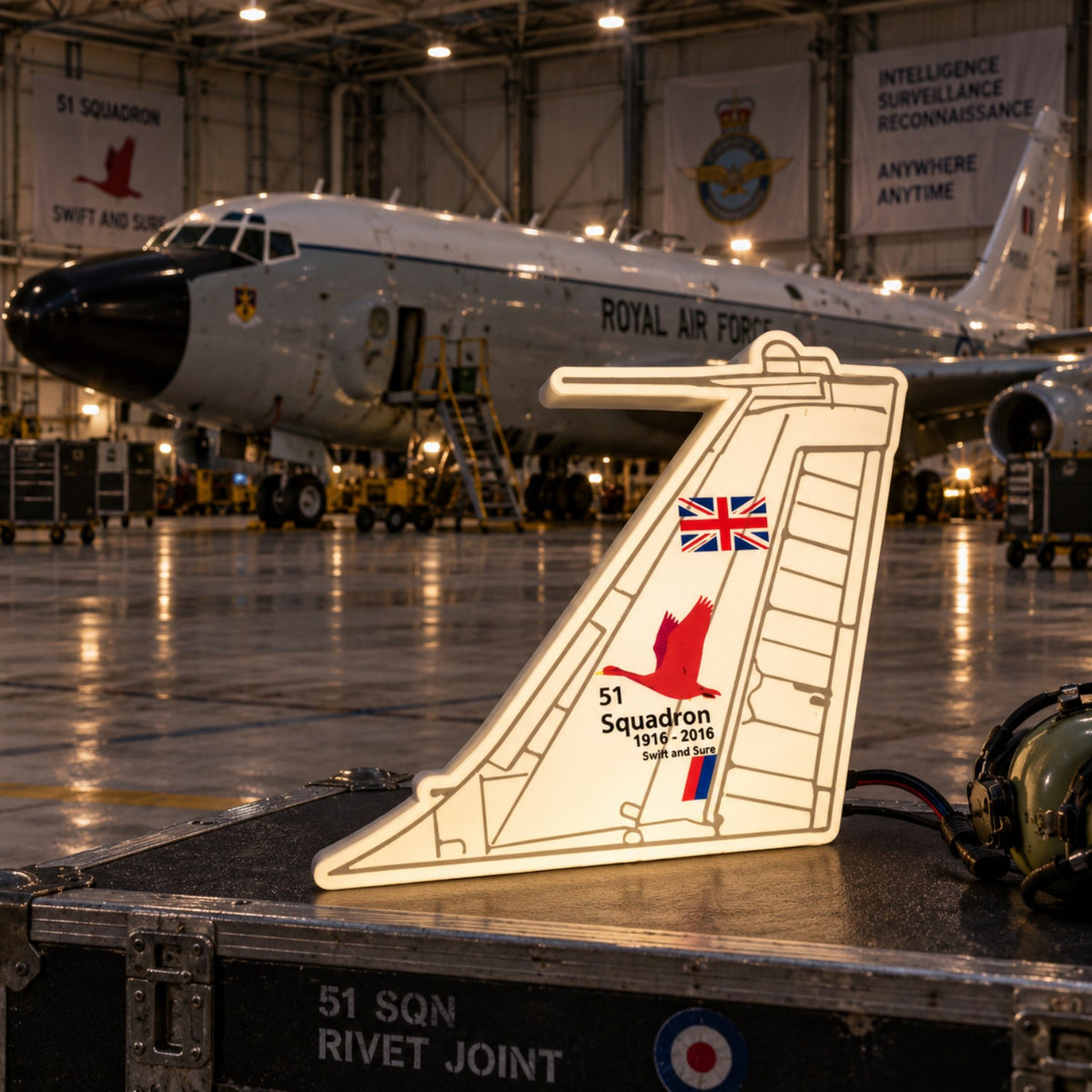 RAF 51 Squadron Rivet Joint 100th anniversary tail LED light displayed in an aircraft hangar