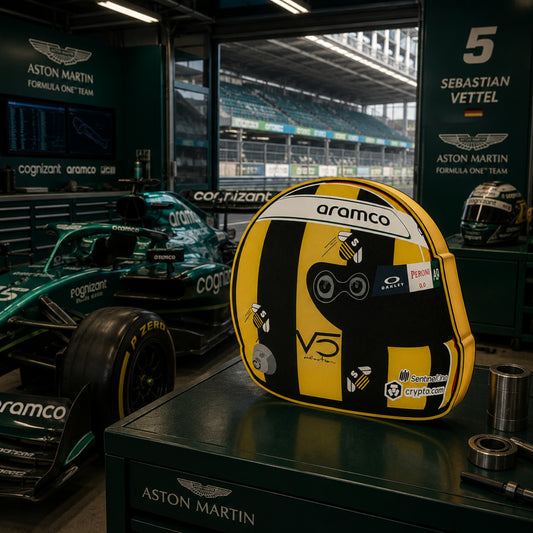 Sebastian Vettel Save the Bees helmet LED light box in an Aston Martin garage-style setting